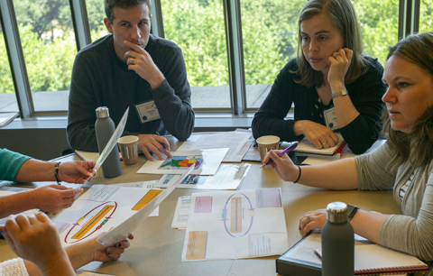 Educators participating in teacher workshops