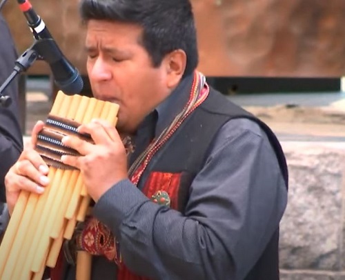 Andean and Latin Fusion Band RAYMI with an Acrobatic Peruvian Scissor Dancer